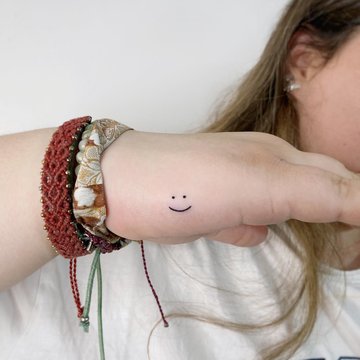 тату смайла