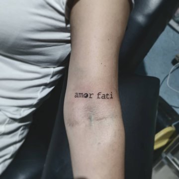 тату Amor Fati