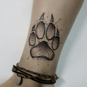 тату у вигляді відбитка лапи