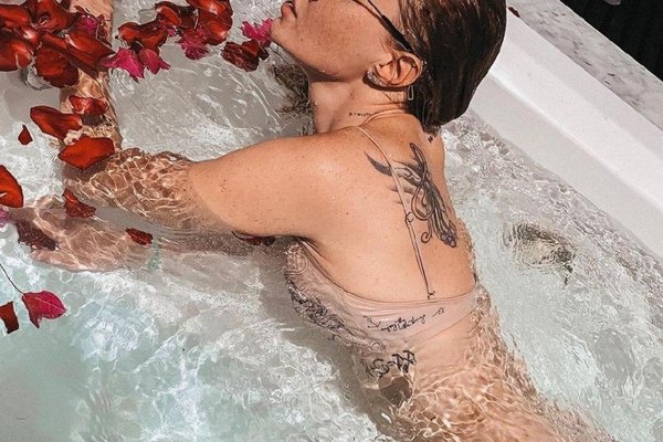 Тату Славы Каминской