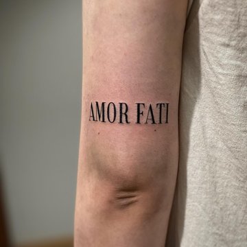 тату Amor Fati