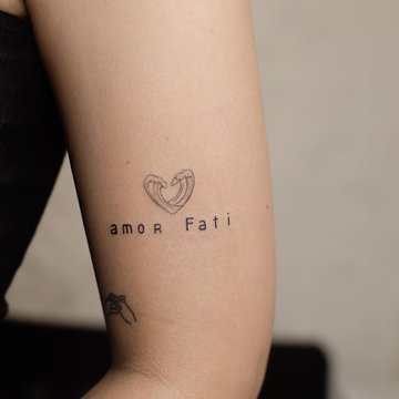 тату Amor Fati