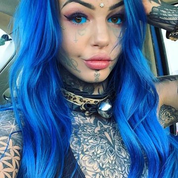 Тату на очному яблуці