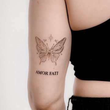 татуювання "Amor Fati"