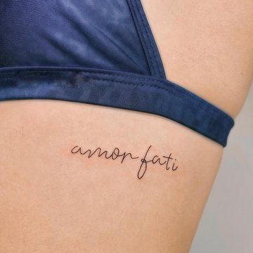 татуювання "Amor Fati"