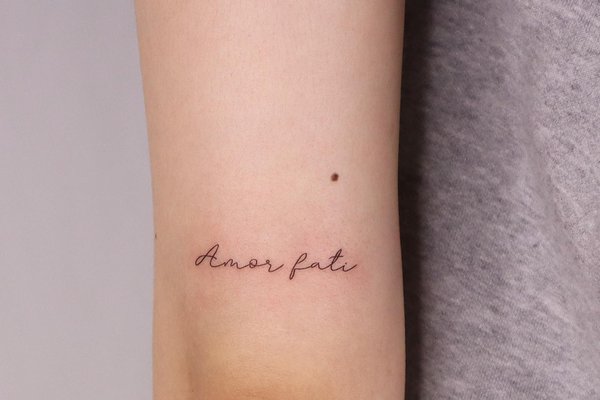 татуювання "Amor Fati"