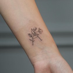 Тату з літерами