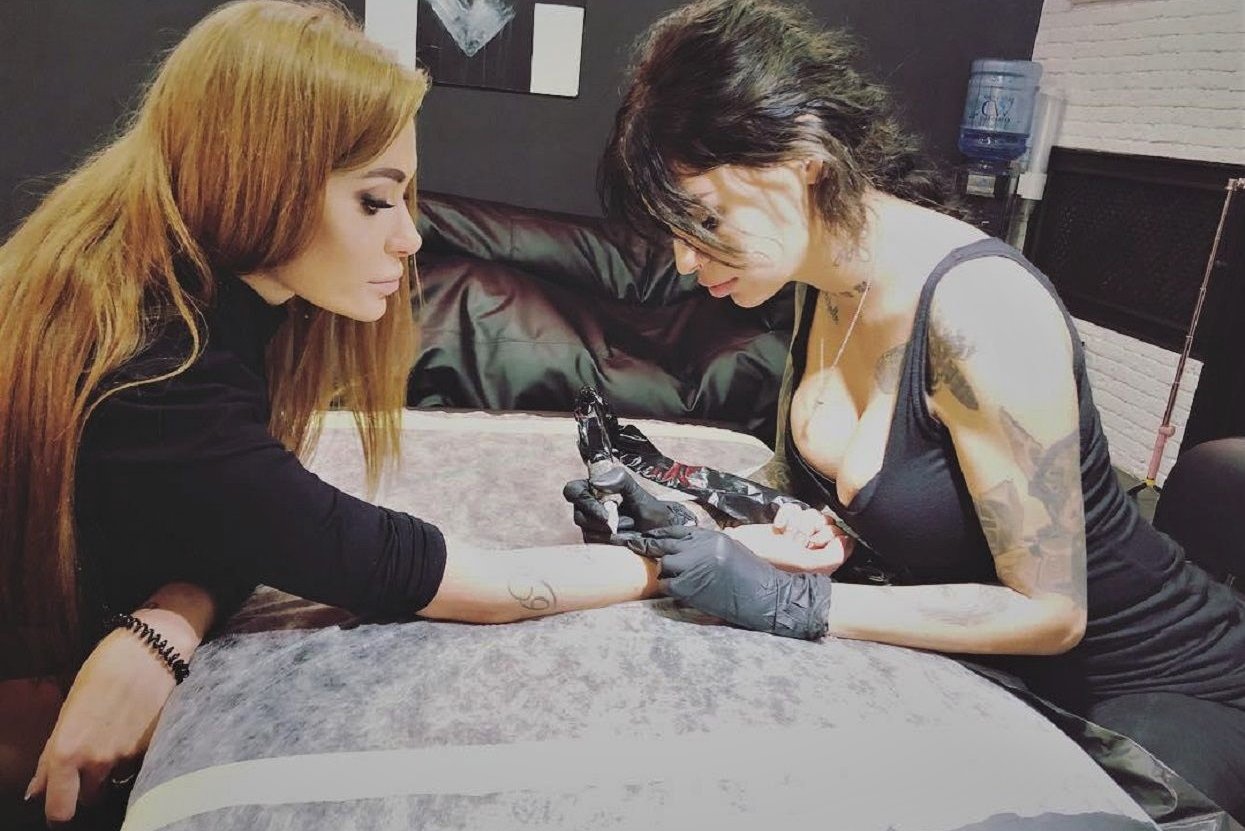 Тату Славы Каминской