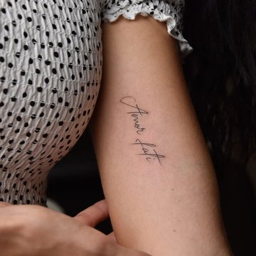 татуювання "Amor Fati"