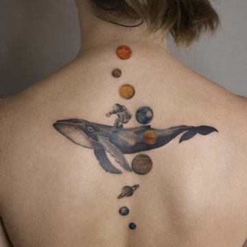 Женские татуировки на спине