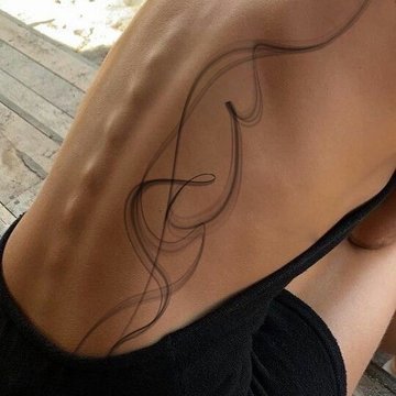 Женские татуировки на спине