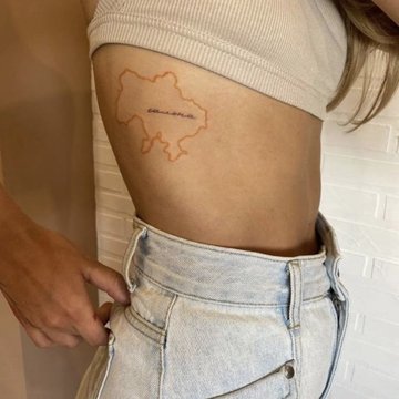 Тату Даші Квіткової