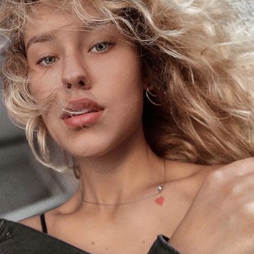 Тату Даші Квіткової