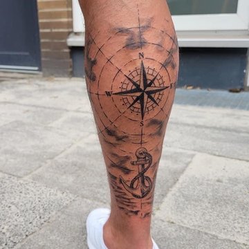 тату компас