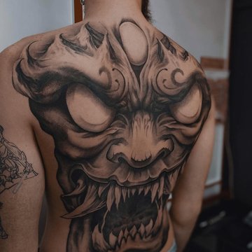 Чоловічі тату на спині