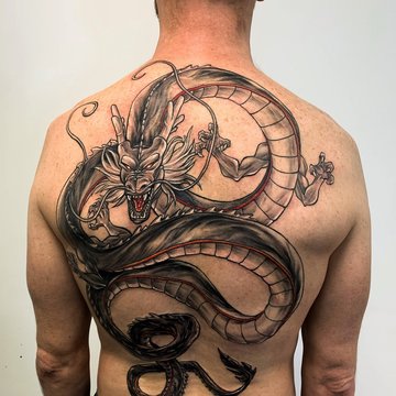 Чоловічі тату на спині