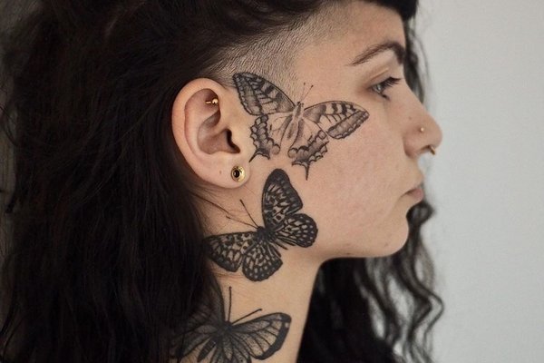 Тату на лице