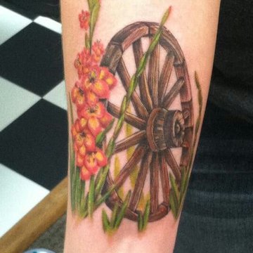 татуировка колесо