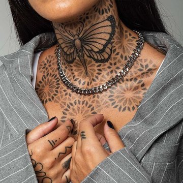 Тату на шиї для жінок