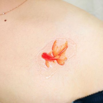 Тату ескізи золота рибка