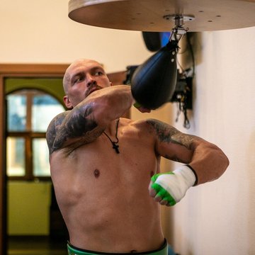 Олександр Усик тату