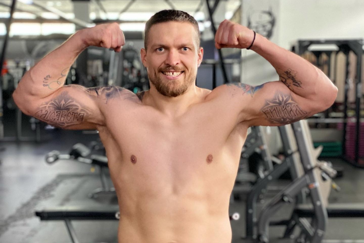 Олександр Усик тату